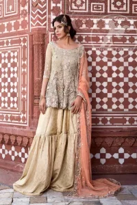 Traditional Gharara. The frock features beautiful embellishments all over the frock. The dress contains a working border on the hemline. Full-length sleeves.