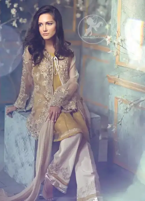 Features marvellous and awesome embellishments all over the front. Features marvellous and awesome embellishments all over the front. Dangling beaded