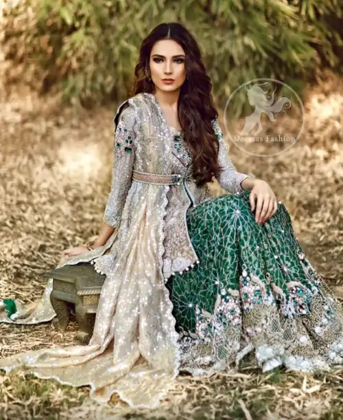 The front open short shirt features marvellous and awesome embellishments accent all over the front and sleeves. Embellished border implemented