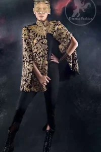 The stylish black front open velvet cape has been embellished heavily on the front and back having a sherwani neckline. Embroidery on this stylish party wear includes antique and dark antique shades of kora, dabka, naqshi, beads, sequins, tilla, etc.