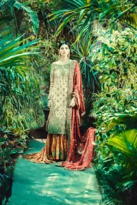 The shirt has been adorned with an embellished neckline. Large embroidered border crafted on hemline. Work border crafted on sides slit. Full-length sheer sleeves and Round neckline.