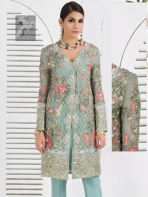 Cascade embroidered chiffon without slits shirt adorned with colorful embellishment. Shirt comes with Opal raw silk trousers and pure crinkle