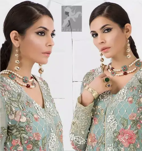 Cascade embroidered chiffon without slits shirt adorned with colorful embellishment. Shirt comes with Opal raw silk trousers and pure crinkle