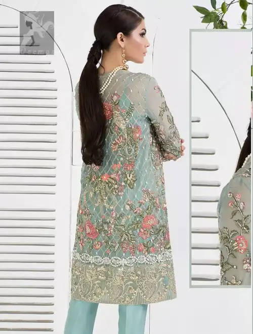 Cascade embroidered chiffon without slits shirt adorned with colorful embellishment. Shirt comes with Opal raw silk trousers and pure crinkle