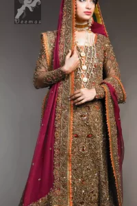 Dark brown heavily embellished back train maxi having rust piping with multiple colour embellishment on lehenga and pinkish red bridal dupatta having antique shades of embellishment all over the dress.