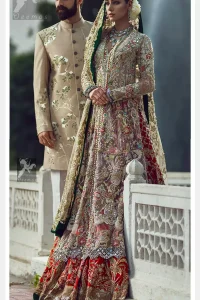 Light fawn pure crinkle chiffon front slits gown adorned with beautiful colorful embellishment. Red lehengha adorned with embellishment all over it. Light pistachio dupatta having embellished border on sides and motif spray all over it and finished with piping.