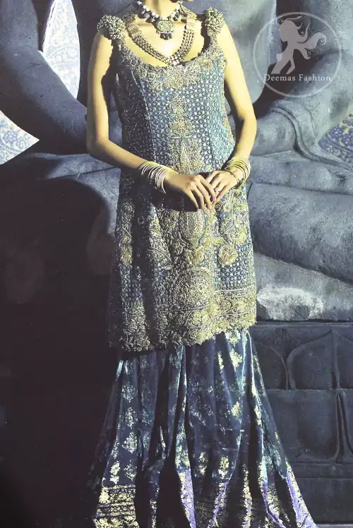 Bluish Slate Grey heavily embellished shirt is decorated with dull golden, champagne and antique shades of embroidery. The shoulders is