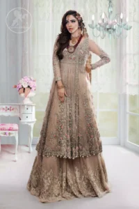 This outfit is meticulously featuring antique shades of kora, dabka, tilla, sequins and pearls.