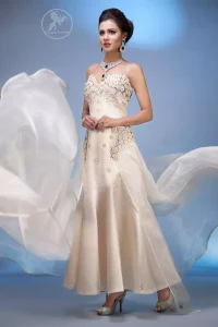 This outfit is a timeless beauty. It is embellished with sweetheart neckline which is decorated with flowers, pearls and swarovski crystal. It is further enhanced with intricate flower patterns on side. It comes with matching brocade pajama and dupatta.