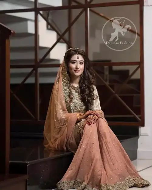 Exude elegance and class in this tissue shirt finessed with beautiful embellishment. The shirt is delicately ornamented with multiple colored