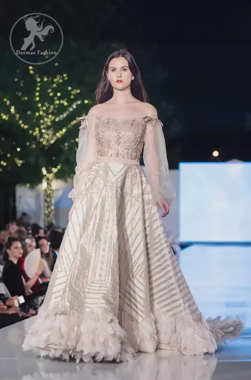 This dress is timeless beauty. The sweetheart neckline is decorated with intricate stones and sequins. Antique shaded kora dabka enhanced