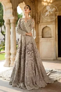 Redefine your style in this traditional and versatile ensemble ornamented with floral and geometric pattern embroidery furnished with kora, dabka, tilla, sequins, kundan, and pearls. It comes with brocade pajama. It is stunningly coordinated with Chiffon dupatta with embellished borders on all sides and sequins spray all over it.
