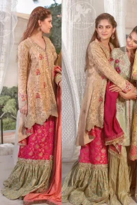 This super stunning back trail shirt is made of rich floral embroidery which is further enhanced with zerdosi work. It is finished with scalloped embellished border all around the shirt. Back of the shirt is decorated with small sized sprinkled motifs all over. The outfit is coordinated with shocking pink & pale green traditional gharara.