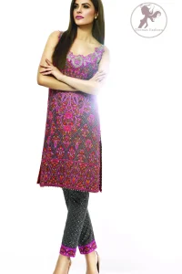 This dress is beautifully sculptured with floral embroidery, adorned with crisscross pattern, colorful embellishments and zerdozi work. The detailed geometric border gives a perfect ending to this shirt.  Having sleeveless sleeves and small sprinkled motifs on shirt. Paired up with cigarette pants which is designed in crisscross pattern. It comprises with magenta chiffon dupatta.