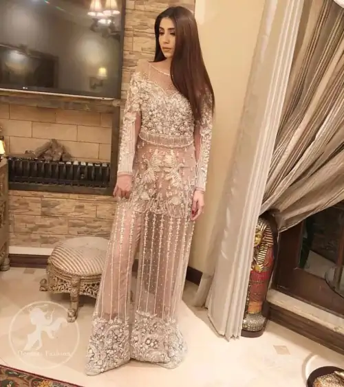 Exude elegance and class in this shirt finessed with beautiful embellished daaman. This dress is beautifully decorated with heavy embroidery.