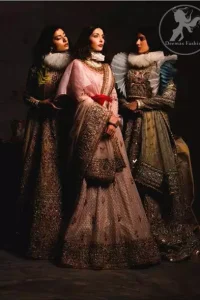 This dress is beautifully sculptured with floral embroidery. It comes with fully embroidered brocade blouse which adds to the look. Pallu is highlighted with kora, dabka, tilla, sequins and pearls. It is allured with delicate tassels.