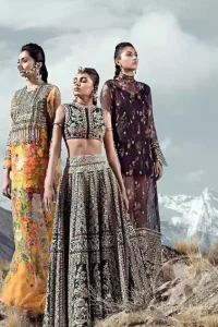 Delicately crafted and personifying chic elegance with an element of grandiose. This dress is beautifully sculptured with floral embroidery, adorned with silver kora, dabka, pearl and sequins work all over. Blouse is beautifully decorated with multiple color floral embroidery . It comes with bottle green lehenga adorned with different styles motifs, geometric patterns and floral embroidery. This outfit is coordinated with chiffon dupatta which is sprinkled with sequins all over it. The borders of dupatta enhanced with lace.