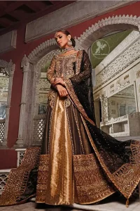 Epitomize whimsical elegance in this front open gown adorned with applique borders and multiple panels. It is further enhanced with kora, dabka, tilla, sequins and pearls. It is allured with atlas brocade inner which adds to the look. It comes with brocade pajama. It is coordinated with chiffon dupatta having four sided embellished applique.