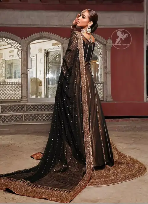 Epitomize whimsical elegance in this front open gown adorned with applique borders and multiple panels. It is further enhanced with