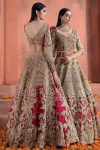 Captured in traditional silhouette, The bridal stands out due to its uniqueness and the perfect fusion of modern cut and traditional embroidery. This dress is beautifully decorated with heavy embroidery. It is highlighted with kora, dabka, tilla, sequins and pearls. Blouse is enhanced with zardosi work on neckline. It comes with full embellished lehenga adorned with applique, floral motifs and sequins spray all over it. It is coordinated with tissue dupatta which is sprinkled with sequins all over it. It is further furnished with four sided scalloped border.