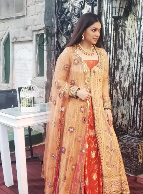 Go for this trendy dress and capture the attention in this persian red inner gold sand gown with kora, dabka