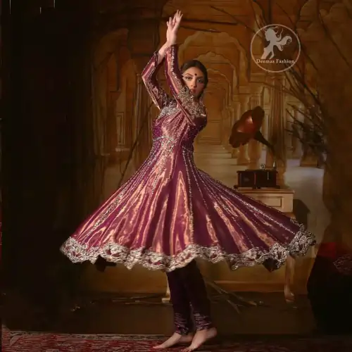 Delicately crafted and personifying chic elegance with an element of grandiose. The detailed kundan work on neckline and vertical panel