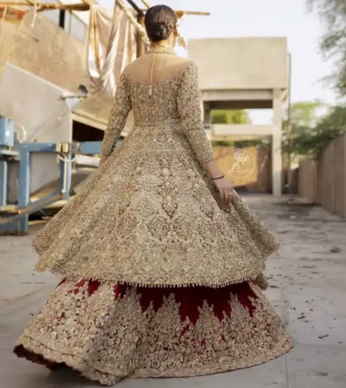 This bridal dress is perfect for your special day. Create a vision of elegance with red wine lehenga decorated with