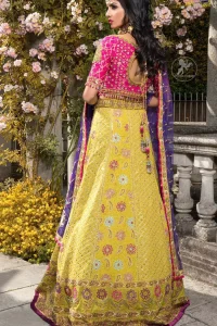 This dress is perfect for menhndi day. The shocking pink blouse is beautifully decorated with antique embroidery. It is highlighted with dull golden kora, dabka, tilla, sequins and pearls. Lehenga has small floral motifs, geometric pattern and detailed zardosi work and rich hemline. It is coordinated with purple chiffon dupatta which have verticle sequins lines all over. Furthermore it is enhanced with lace on all four sides of border.