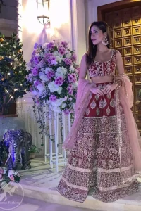 Steal the moment with our sepia brown blouse skirt emphasized with traditional embroidery and intricate floral embellishment enhanced with gold kora, dabka and sequins. It comes with heavy embellished lehenga which emphasized with different motifs and floral embroidery. It is coordinated with tissue dupatta which is sprinkled with sequins all over it.