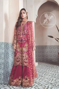 A picture of pure elegance with our net tapestry shirt enhanced with embellished neckline. The daaman is further highlighted with embellished scalloped border. It is paired up with embellished trousers adorned with beautiful motifs. It comes with net dupatta having four sided embroidered border and sprinkled with sequins all over it.