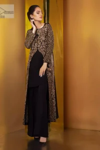 Perfected with antique gold and dark antique embellishments this black velvet ensemble is timeless masterpiece in to a chic fantasy. Delicately crafted with zardosi, kora, dabka, tilla, sequins and pearls. Furthermore it is adorned with geometric patterns all over.  Beautifully designed sleeves is an amalgamation of geometric and floral design elements. This outfit is finished with black raw silk palazzo pants and pure chiffon dupatta.