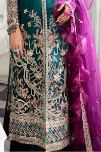  Modern yet traditional. Boost your confidence and style in this glamorous attire accentuated with finest thread work and zardosi embroidery. The outfit is beautifully sculptured with colorful embellishment and finessed with beautiful embellished applique hemline. Having full sleeves with scalloped finishing. The outfit is coordinated with crushed sharara and magenta dupatta adorned with four sided lace border and frill.