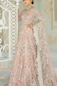 An example of beauty and elegance. Look breathtakingly stylish in this embroidered regalia furnished with intricate embroidered neckline. This ethereal maxi highlights the collision of heritage and beauty of traditional zardosi craftsmanship with modern chic silhouette. Beautifully designed sleeves is an amalgamation of geometric and floral design elements. The light pink net dupatta with chann and scalloped applique border all around the edges makes the look complete.