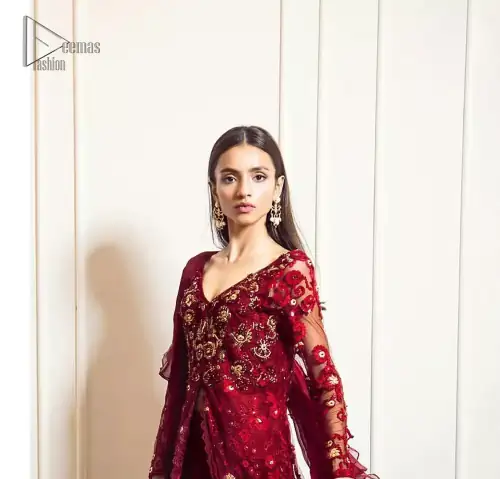 This exceptionally detailed front open gown lehenga is cut in a seductive fit and flare silhouette that’s sure to turn