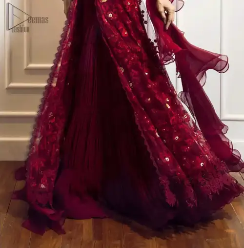 This exceptionally detailed front open gown lehenga is cut in a seductive fit and flare silhouette that’s sure to turn