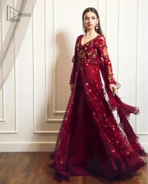 This exceptionally detailed front open gown lehenga is cut in a seductive fit and flare silhouette that’s sure to turn