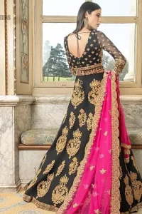 This outfit is an immensely captivating traditional piece, enhancing the art of classical heritage showcasing the craftsmanship of kora and dabka detailed with pearls; artistically embellished to give a beautiful rhythm to the outfit.  Blouse is enhanced with zardosi work.  It comes with full embellished lehenga adorned with different sizes motifs and finished with thin border. It is coordinated with pink chiffon dupatta which is sprinkled with small motifs all over. It is further furnished with four sided scalloped border.