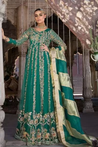 Steal the moment with our emerald green floor length angrakha emphasized with traditional neckline and intricate floral daman enhanced with light golden kora, dabka and sequins. The detailed zardosi work on sleeves and vertical panel stripes ornamented with gold kora and dabka embroidery on the bodice, the thick borders and floral bunches refined the classical royal look. Style it up with organza dupatta adorned with four sided kiran.