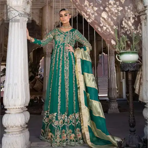 Steal the moment with our emerald green floor length angrakha emphasized with traditional neckline and intricate floral daman enhanced with