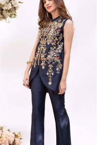 This outfit is timeless beauty. Boost your confidence and style in this glamorous attire accentuated with finest zardozi and thread work. The shirt is delicately handcrafted with golden zarozi work and multiple color thread embroidery. Style it up with navy blue bell bottom pants which complete the look.