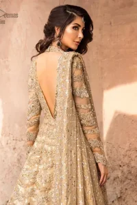 This artisanal piece is rendered in grace and timelessness. The floor length maxi highlights the collision of heritage and beauty of traditional zardozi work and craftsmanship with modern chic silhouette. The bodice with plunging V-neckline is adorned in richly zardozi work with fabulous sparkle. It boasts a pretty scallop hemline. The lehnga is done with thick kora and dabka borders to completes the look. This outfit is comprises with chiffon dupatta sprinkled with sequins on the ground and and four sided border.