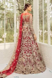 This bridal dress is perfect for your big day. Our bride makes a statement in this stunningly floraison, perfect blend of glamour and tradition with outstanding craftsmanship and gorgeous detailing. This floor length maxi is beautifully sculptured floral jhaal, floral bunches and thick scalloped hemline done with light golden kora, dabka, tilla and sequins embroidery. Exude elegance with red lehenga finessed with beautiful embellished scalloped bottom with zardosi work. The red net dupatta with chann and finishing all around the edges makes the look complete.