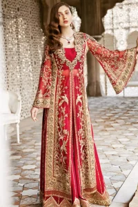Beautifully elegant with a modern twist. This dress is crafted from delicate floral lace and features a scalloped plunge neckline. The front of the gown is adorned with floral embroidery, bunches and thick embellished side slits done with golden and antique zardozi work. Back of the gown is emphasized with black applique detailing and geometric patterns. The gown is finishing with tassels on the hemline on both sides frond and back. The palazzo pants is adorned with thick embellished applique bottom with golden kora, dabka, tilla and sequins embroidery. It comprises with red chiffon dupatta with sequins spray all over.