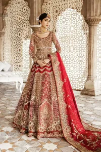 Captured in traditional silhouette, This traditional red pishwas is aesthetically designed with motifs,geometric and floral patterns, embellished with kora, dabka, tilla and sequins work. It comes with full embellished lehenga which is gorgeously handcrafted with golden and antique shaded zardozi work. The piece comes with a handcrafted belt. It is coordinated with net dupatta which is sprinkled with sequins all over it. It is further furnished with four sided border and floral bunches.