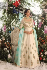 This outfit should be the next addition to your wardrobe. An example of beauty and elegance. Look breathtakingly stylish in this embroidered regalia furnished with intricate embroidered neckline which is embellished with antique shaded zardozi work and ferozi stones. Furthermore, this multiple panel frock is adorned with different sized motifs scattered all over the frock. It is coordinated with ivory churidar pajama. Finished the look with self printed chiffon dupatta having four sided applique on it.