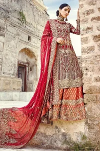 You are all set to make a lasting impact with the divine royalty of this dress. This beautiful dress comes with a maroon back train lehenga with beautiful embellishment around the hem. The shirt is adoned with golden zardozi work around the neckline and vertically worked gold lines and it finished with a thick embellished border. The sleeves are embellished with motifs all over along with a thick embroidered border. The dupatta incorporates beautifully designed borders on all four sides, focusing on the heavily embellished pallu borders to give it a perfect maharani look.