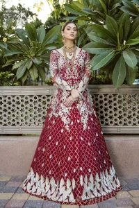This front open marron maxi is creating a dreamy composition. The chic yet elegant front open maxi is decorated with floral embroidery , heavily embellished bodice and floral bunches. Hemline is even more enhanced with birds motifs finished with jamawar lining adorned with geometric patterns in it. The embroidery is done with silver and white kora, dabka, tilla, and pearls. It comes with straight trousers allured with sprinkled motifs on dupatta dupatta finished with silver lace all around the edges.  