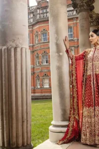 Crafted with love. Make your big day more beautiful with our excessively embroidered front open gown featuring delicately embellished neckline along with geometric patterns highlighted in zardozi detailing and intricately embroidered bottom that gives perfect ending to this outfit. Crafted artfully with golden kora, dabka, tilla, sequins and thread work. The embellished alluring scalloped borders dupatta gives the perfect ending to this peplum. The dupatta is furthermore enhanced with dangling tassels and multiple color thread embroidery.