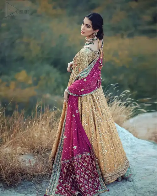 This exceptionally detailed anarkali frock is cut in a seductive fit and flare silhouette that’s sure to turn heads. The