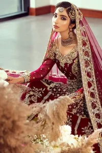 Did you recently say “YES” to the person of your dreams? Now it’s time to start searching for the perfect dress. Then hold your breath, as we reveal this masterpiece. A sensational affair so timeless and magnificent, beautifully crafted with light golden zardozi work. Craftmanship and skills you've never witnessed before. The pishwas is fully decorated with geometric patterns, floral bootis and tea rose embroidered appliqued bottom. It is paired with an ethereal bridal dupatta focusing on kora and dabka handwork borders on all four sides, finishing with scattered tiny floral motifs on the ground.